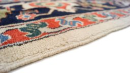 Central medallion detail of 1990s Gharajeh rug from Iran / Persia