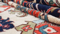 Close-up detail of 1990s Gharajeh rug from Iran / Persia showing Wool weave