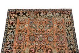 Surface texture of 1880s Gharajeh rug with natural Wool and intricate pattern
