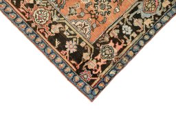 Backside of handmade 1880s Gharajeh rug showing knot structure and weave density