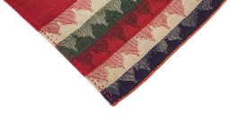 Backside of handmade New Ghashghai rug showing knot structure and weave density