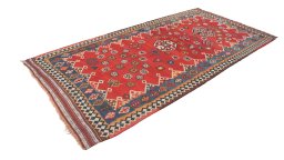 Corner detail of 1940s Ghashghai rug showing border pattern and Wool pile