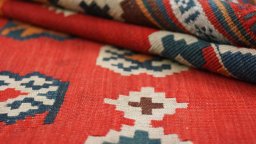 Close-up detail of 1940s Ghashghai rug from Iran / Persia showing Wool weave