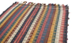 Surface texture of 1940s Ghashghai rug with natural Wool and intricate pattern