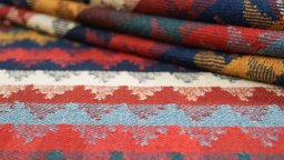 Corner detail of 1920s Ghashghai rug showing border pattern and Wool pile