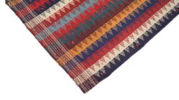 Backside of handmade 1920s Ghashghai rug showing knot structure and weave density