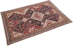 Close-up detail of 1900s Ghashghai rug from Iran / Persia showing Wool weave