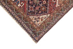 Backside of handmade 1900s Ghashghai rug showing knot structure and weave density