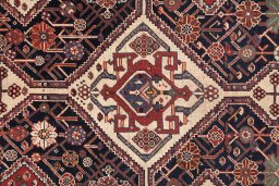 Central medallion detail of 1900s Ghashghai rug from Iran / Persia