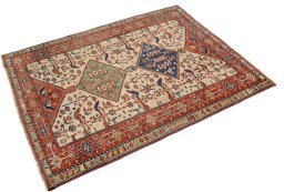 Corner detail of 2000s Ghashghai rug showing border pattern and Wool pile