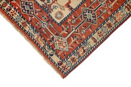 Backside of handmade 2000s Ghashghai rug showing knot structure and weave density