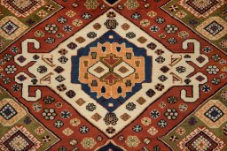 Central medallion detail of New Ghashghai rug from Iran / Persia