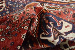 Close-up detail of 2000s Ghashghai rug from Iran / Persia showing Wool weave