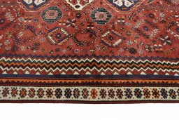 Full view of 2000s Ghashghai rug from Iran / Persia, 265 × 160 cm in Red tones