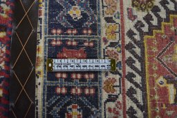 Close-up detail of 2000s Ghashghai rug from Iran / Persia showing Wool weave