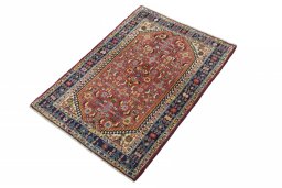 Corner detail of 2000s Ghashghai rug showing border pattern and Wool pile