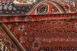 Corner detail of 2000s Ghashghai rug showing border pattern and Wool pile