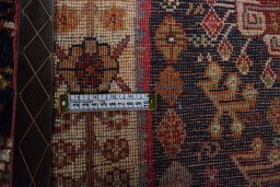 Surface texture of 2000s Ghashghai rug with natural Wool and intricate pattern