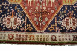 Close-up detail of 2000s Ghashghai rug from Iran / Persia showing Wool weave