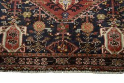 Close-up detail of 2000s Ghashghai rug from Iran / Persia showing Wool weave