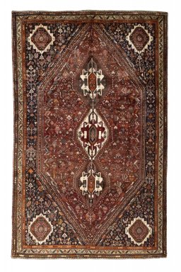 Full view of 2000s Ghashghai rug from Iran / Persia, 296 × 185 cm in Red tones
