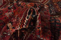 Close-up detail of 2000s Ghashghai rug from Iran / Persia showing Wool weave