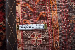 Surface texture of 2000s Ghashghai rug with natural Wool and intricate pattern