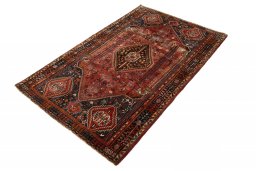 Corner detail of 2000s Ghashghai rug showing border pattern and Wool pile
