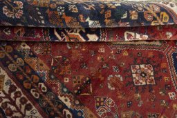 Full view of 2000s Ghashghai rug from Iran / Persia, 260 × 170 cm in Red tones
