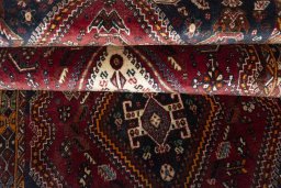 Full view of 2000s Ghashghai rug from Iran / Persia, 282 × 118 cm in Red tones