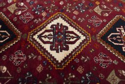 Central medallion detail of 2000s Ghashghai rug from Iran / Persia