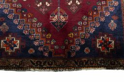 Close-up detail of 2000s Ghashghai rug from Iran / Persia showing Wool weave