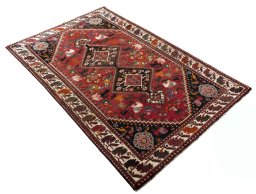 Close-up detail of 2000s Ghashghai rug from Iran / Persia showing Wool weave