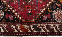 Central medallion detail of 2000s Ghashghai rug from Iran / Persia