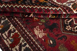 Full view of 2000s Ghashghai rug from Iran / Persia, 266 × 161 cm in Red tones