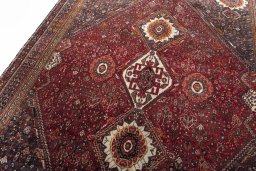 Backside of handmade 2000s Ghashghai rug showing knot structure and weave density