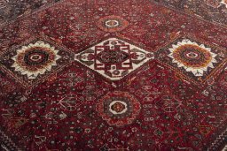 Central medallion detail of 2000s Ghashghai rug from Iran / Persia