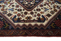 Corner detail of 2000s Ghashghai rug showing border pattern and Wool pile