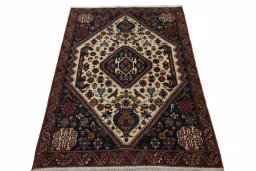Surface texture of 2000s Ghashghai rug with natural Wool and intricate pattern