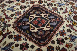 Central medallion detail of 2000s Ghashghai rug from Iran / Persia