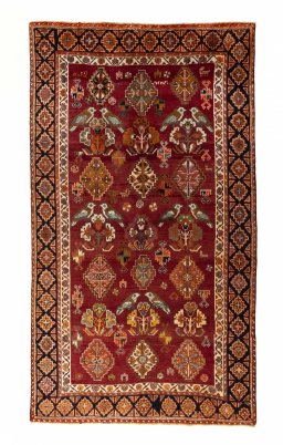 Full view of 2000s Ghashghai rug from Iran / Persia, 254 × 144 cm in Red tones