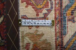 Surface texture of 2000s Ghashghai rug with natural Wool and intricate pattern