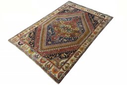 Corner detail of 2000s Ghashghai rug showing border pattern and Wool pile