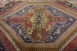 Central medallion detail of 2000s Ghashghai rug from Iran / Persia