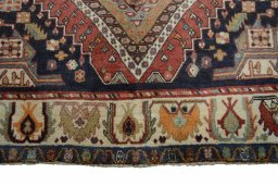 Close-up detail of 2000s Ghashghai rug from Iran / Persia showing Wool weave