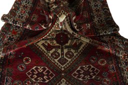 Corner detail of 1950s Ghashghai rug showing border pattern and Wool pile
