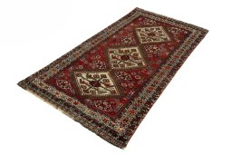 Corner detail of 1950s Ghashghai rug showing border pattern and Wool pile