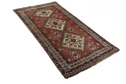 Close-up detail of 1950s Ghashghai rug from Iran / Persia showing Wool weave