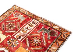 Surface texture of 1994s Ghashghai rug with natural Wool and intricate pattern