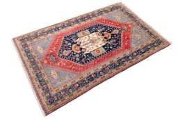 Corner detail of 1984s Ghashghai rug showing border pattern and Wool pile